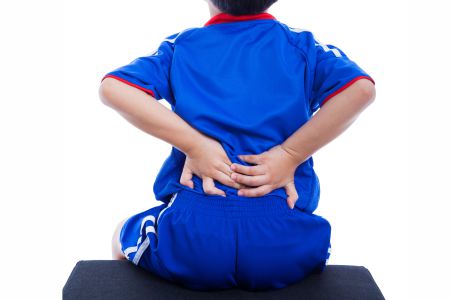 What are the symptoms of Back Pain in Children?
