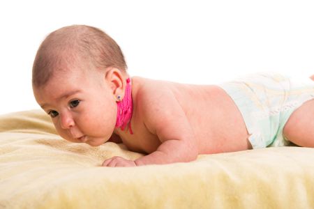 What are the symptoms of Congenital Muscular Torticollis